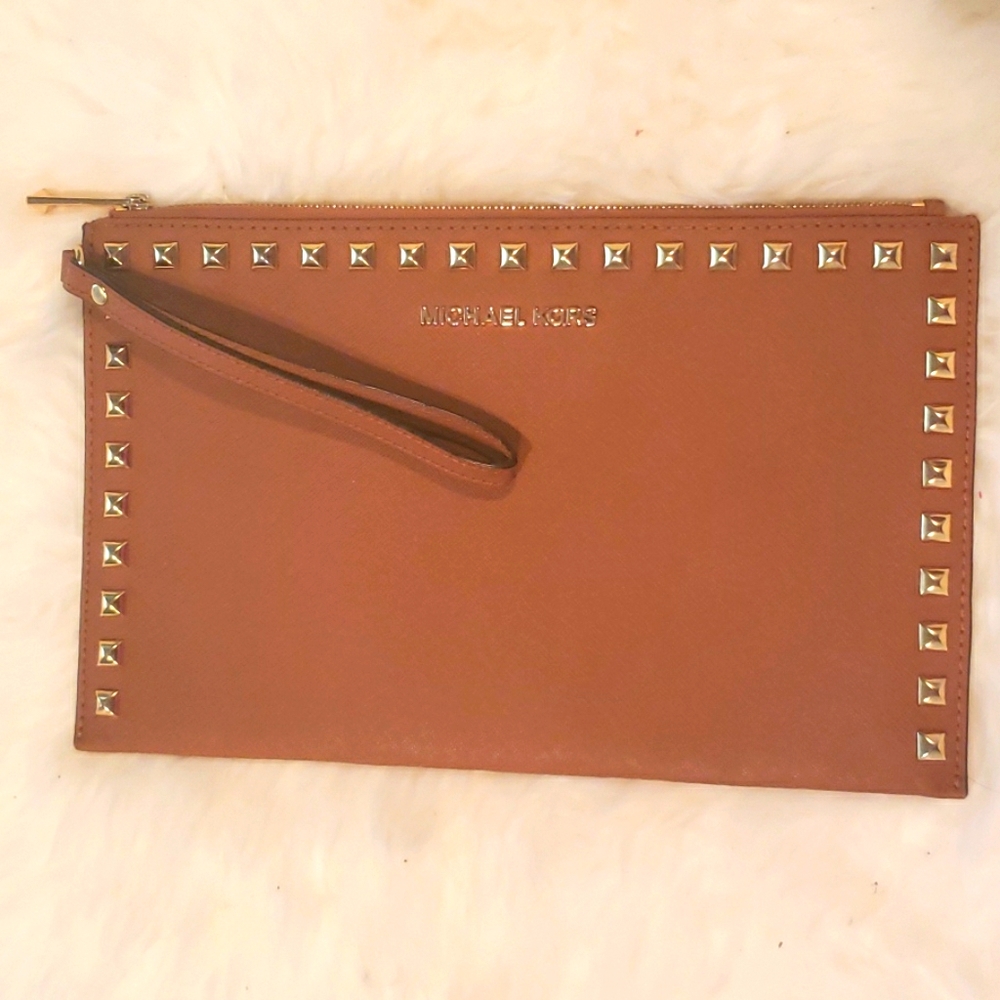 Michael Kors clutch in luggage color